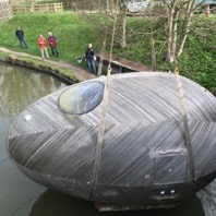 Exbiry Egg lowered into Grand Union Canal, Milton Keynes, March 2017